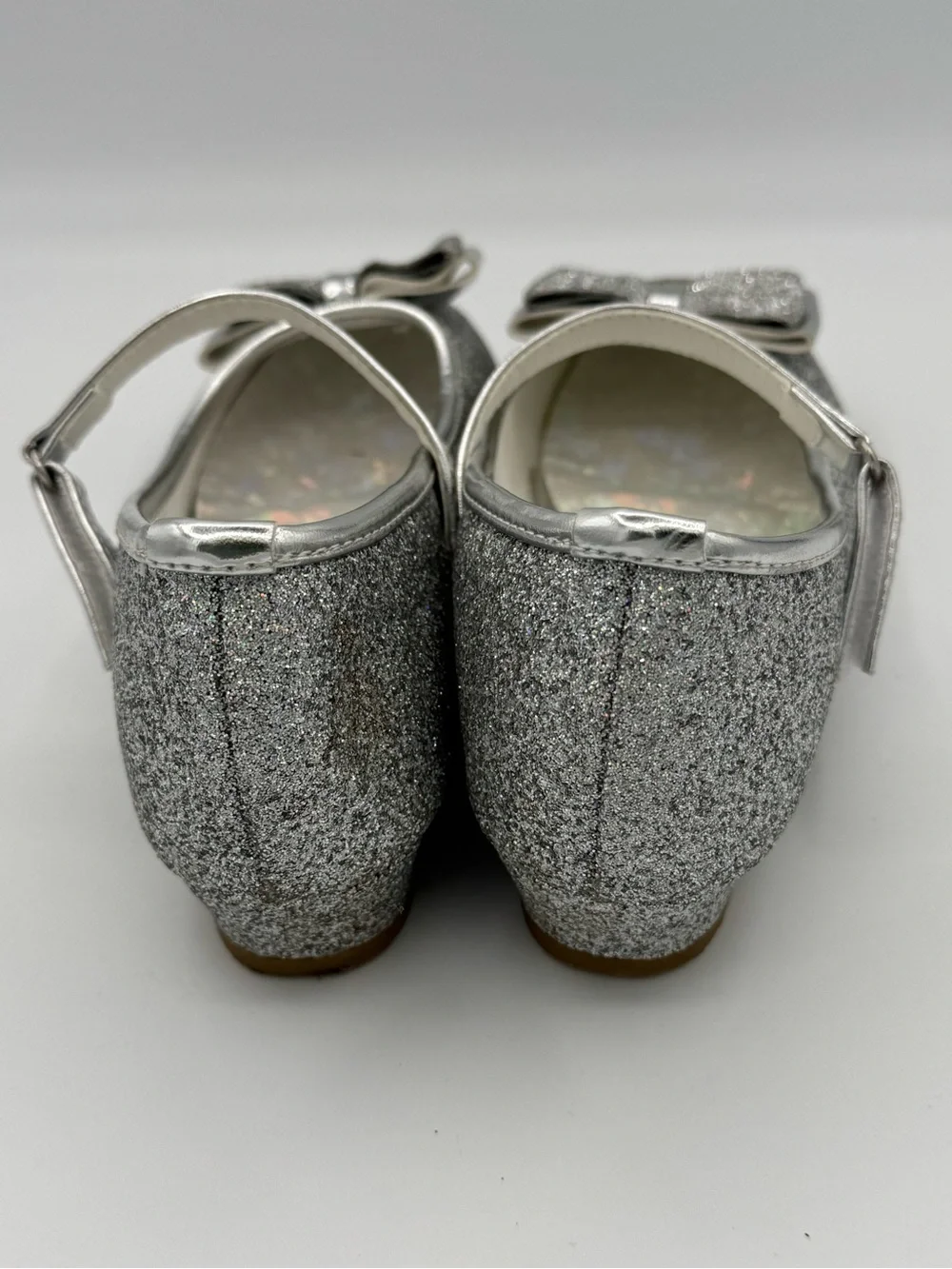 Stelle Mary Jane Silver Glitter Shoes with Prominent Bow
